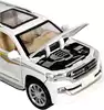 Модель машины Toyota Land Cruiser 1:24 свет, звук, Инерционный механизм 24272
