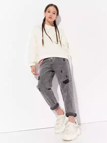 Джинсы с прорезями Vulpes