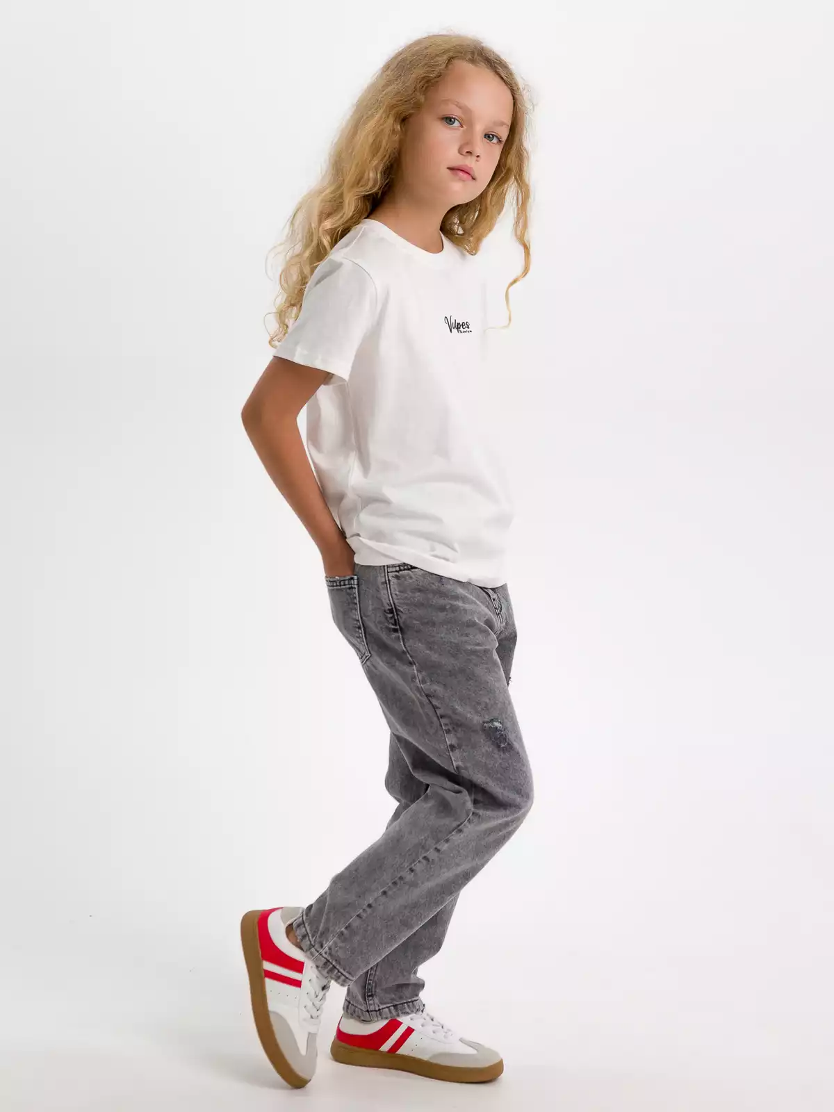 Джинсы с прорезями Vulpes